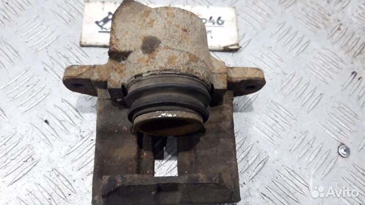 Суппорт тормозной передний левый Renault Logan 1