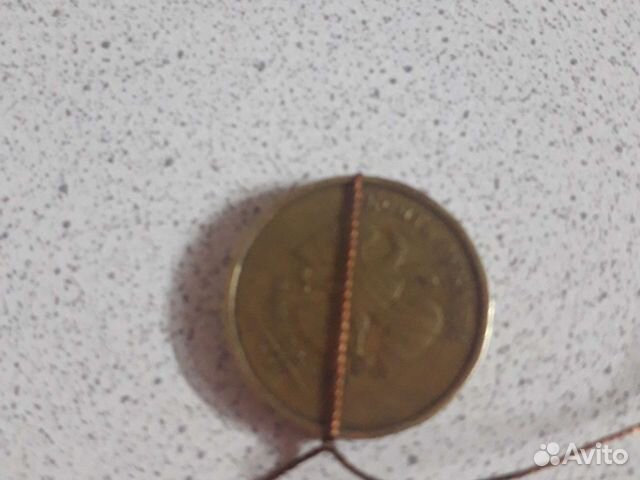 Монета 10р брак 2011г поворот