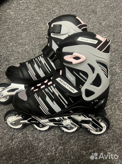 Роликовые коньки