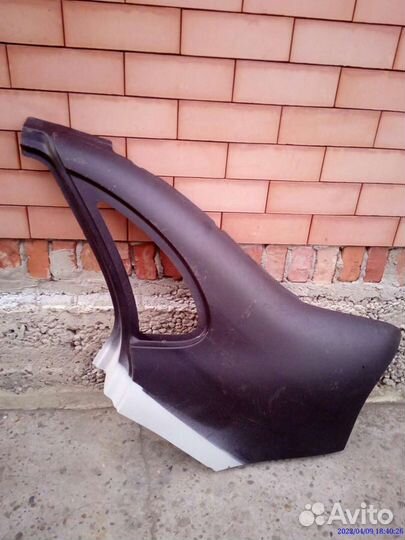 Крыло задне левое лада калина
