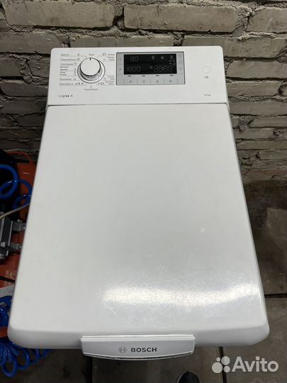 Стиральная машинка с вертикальной загрузкой Bosh