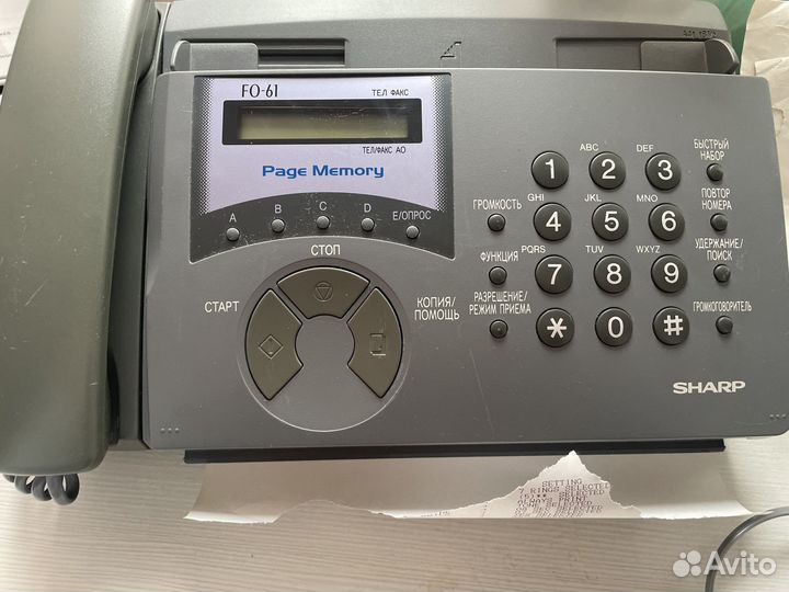 Телефон факс в идиальном состоянии с бумагой