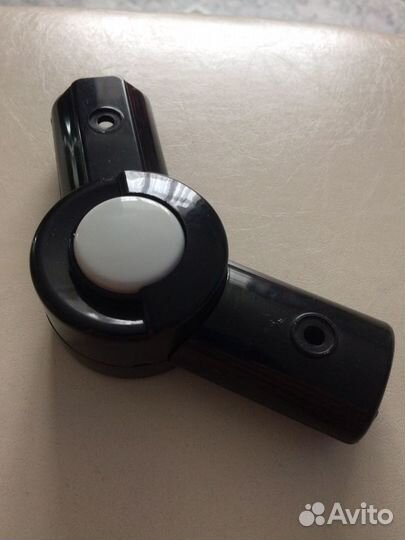 Шарнир регулирования ручки коляски