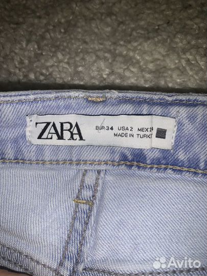 Джинсы zara с разрезами 34