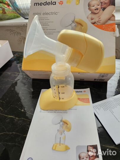 Молокоотсос medela электрический
