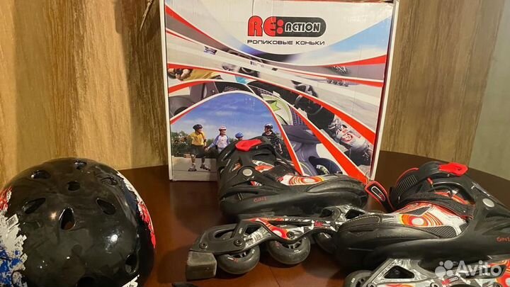 Роликовые коньки