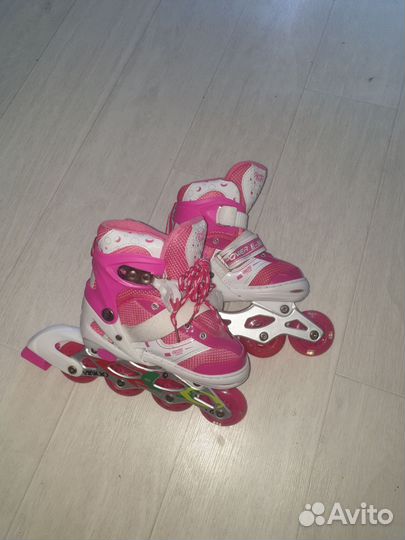 Роликовые коньки