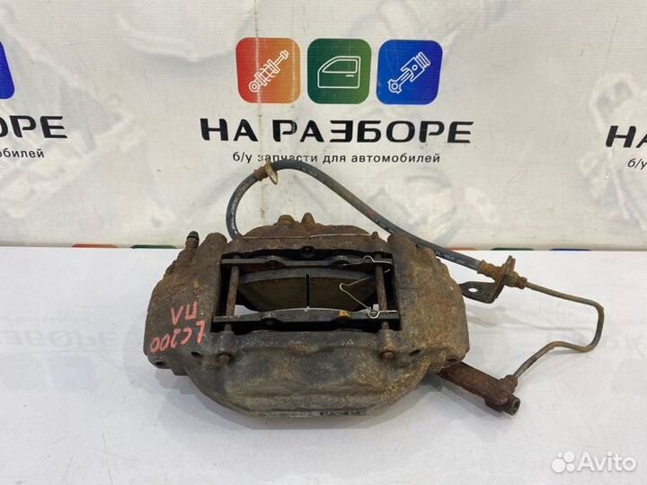 Суппорт передний левый Toyota Land Cruiser 200