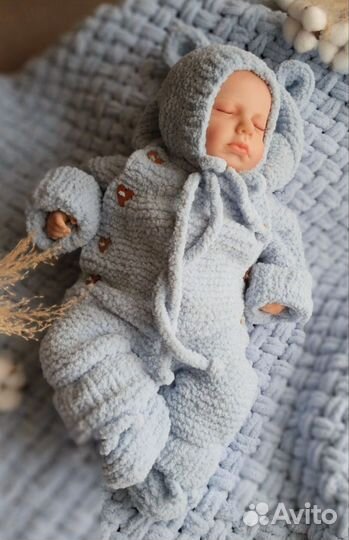 Вязанный комбинезон для новорожденного