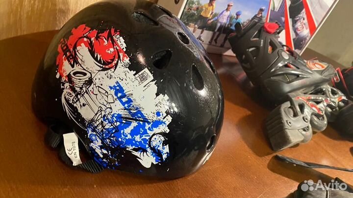 Роликовые коньки