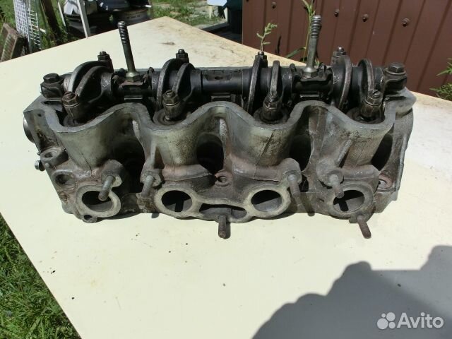 Головка блока цилиндров двигателя Е13