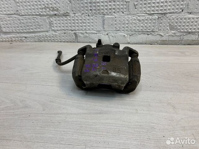 Суппорт тормозной передний правый Nissan Teana J32