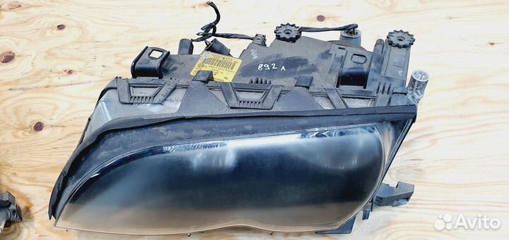 Фара левая BMW E46