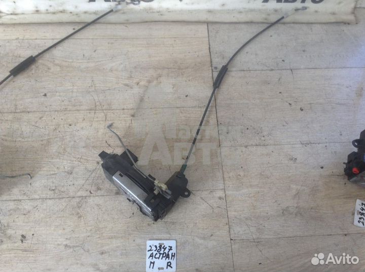 Замок двери передний Опель Астра Н