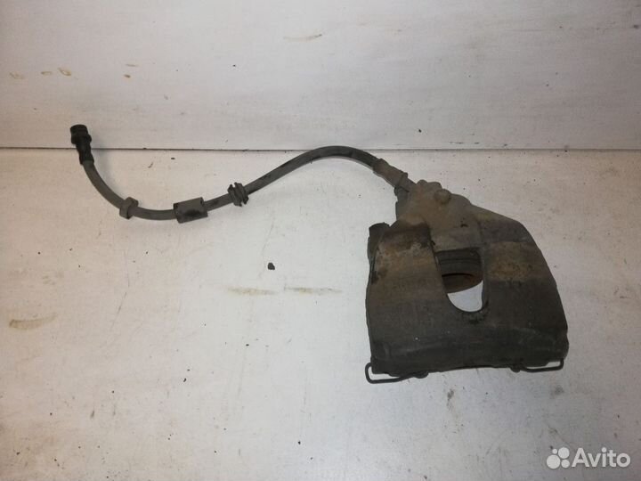 Суппорт тормозной правый Ford Focus 2