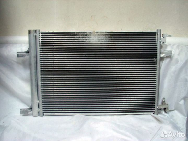 Радиатор кондиционера Опель Астра J g джей 2010