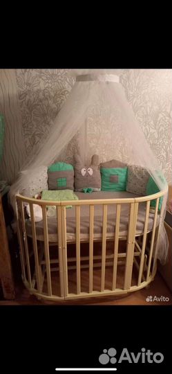 Детская кроватка с маятником круглая