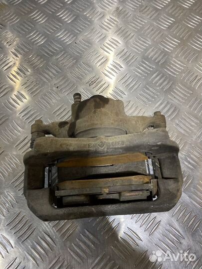 Суппорт тормозной передний левый Chevrolet Aveo