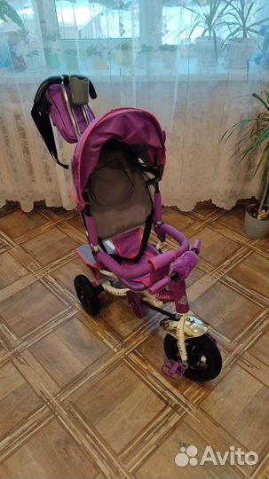 Детский трехколесный велосипед с ручкой