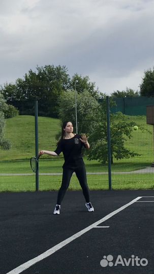 Тренер по большому теннису