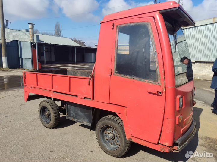 Электрическая кара бортовая с кабиной ет-21023