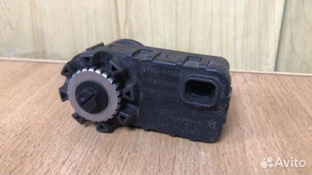 Моторчик корректора фары Mitsubishi Outlander GF