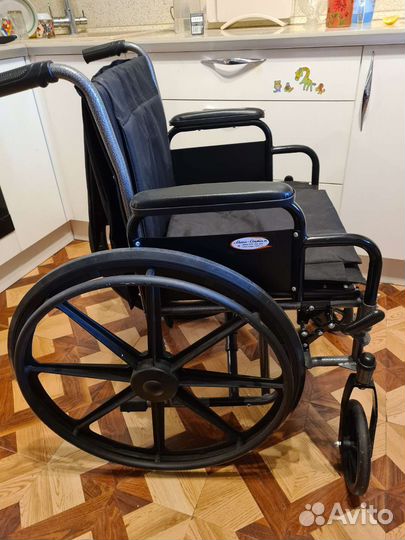 Инвалидная коляска новая