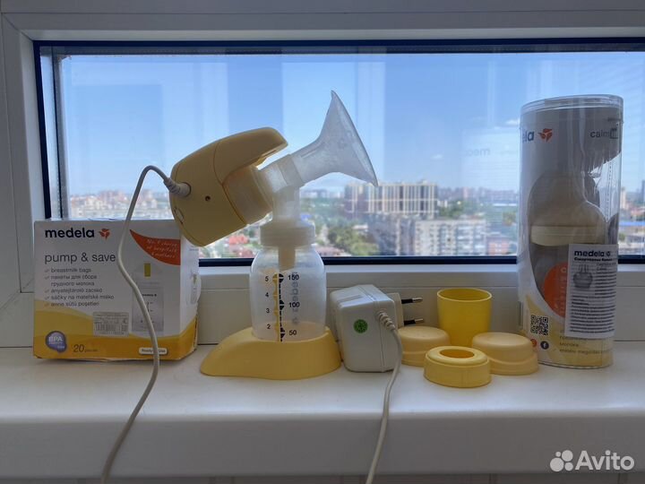 Молокоотсос Medela mini electric