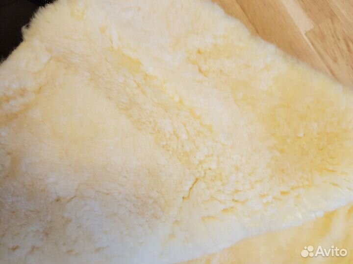 Меховой конверт в коляску фирмы Christ