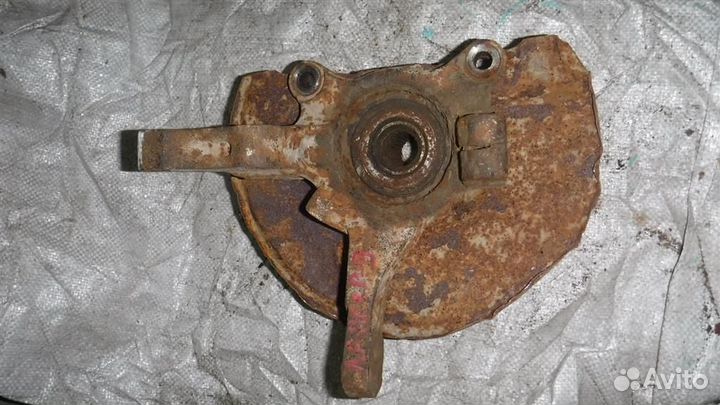 Кулак поворотный передний левый Mitsubishi Lancer