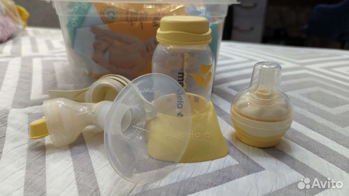 Молокоотсос medela ручной
