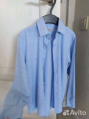 Рубашка голубая новая 134-140 на мальчика