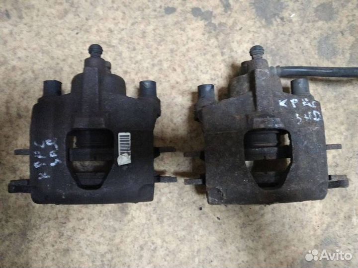 Суппорт тормозной задний Chrysler Voyager 4