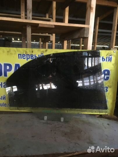 Стекло двери заднее левое Kia Shuma