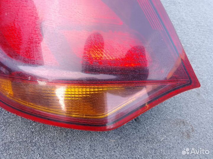 Фонарь задний левый Opel Astra J