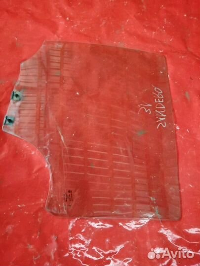 Стекло задней левой двери Renault Sandero