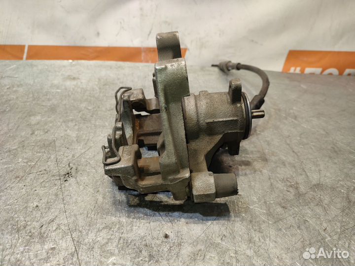 Суппорт тормозной задний левый Volkswagen Tiguan