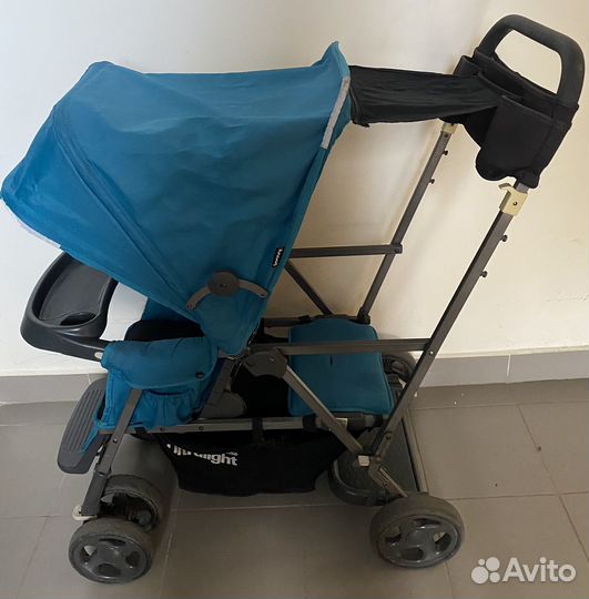 Коляска для погодок