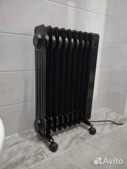 Новый масляный обогреватель Midea MOH3034 черный