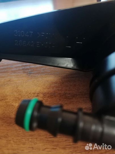 Форсунки омывателя фар L-R Nissan Tiida