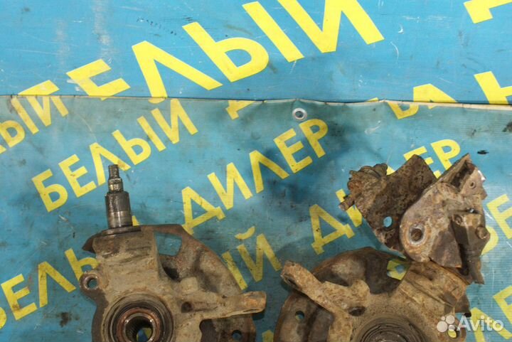 Поворотный кулак Nissan Primera P10