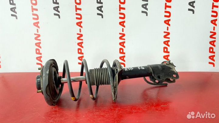 Стойка подвески передняя левая Nissan Cefiro A33