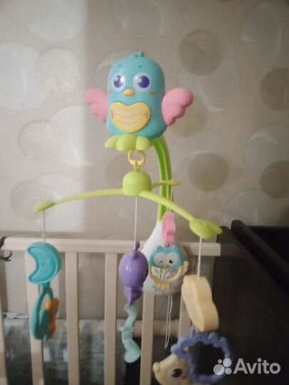 Музыкальный мобиль на кроватку