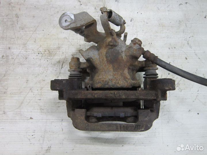 Суппорт тормозной задний Mitsubishi Outlander 3