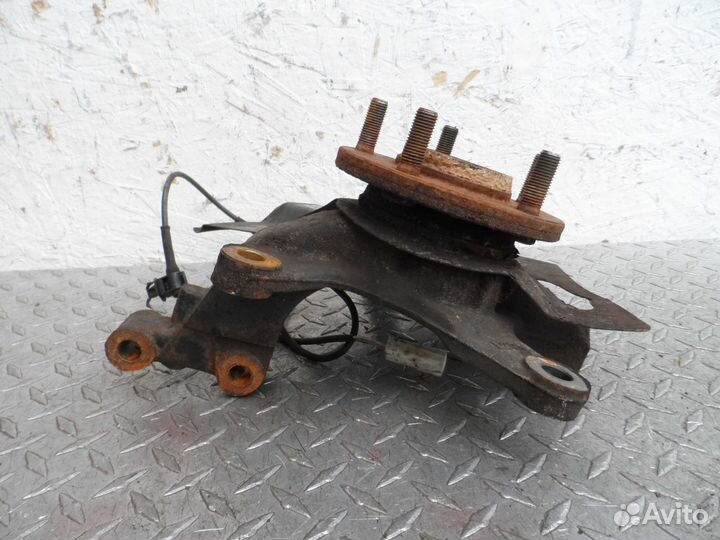 Кулак поворотный левый Mazda CX-7 ER