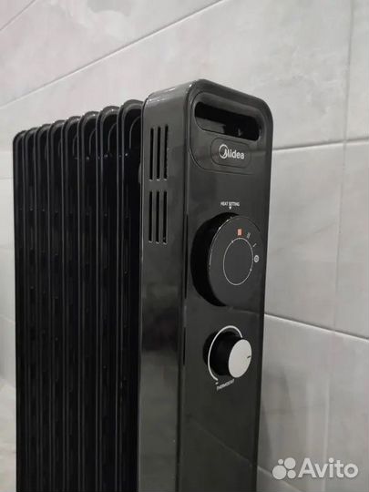 Новый масляный обогреватель Midea MOH3034 черный