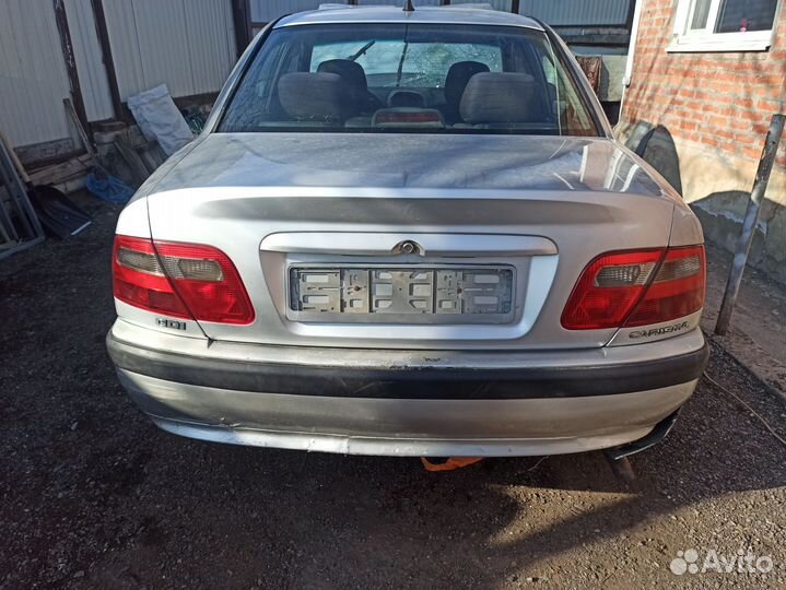 Бампер задний Mitsubishi carisma