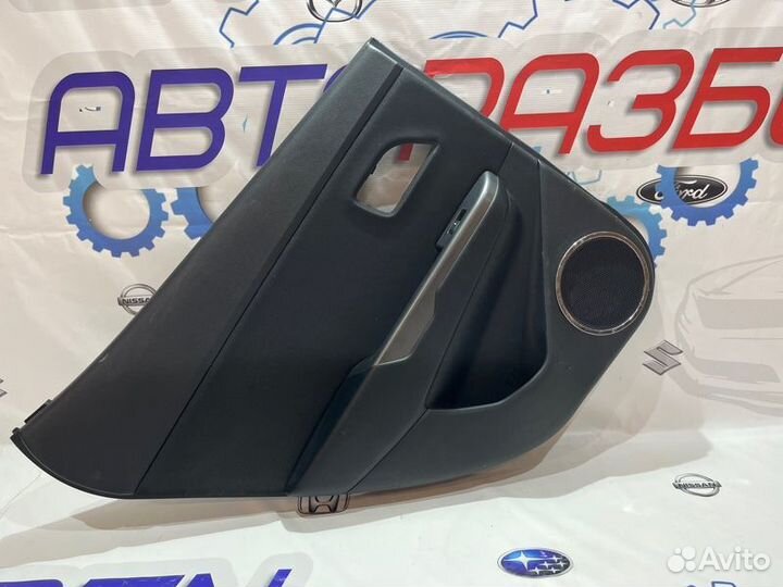 Обшивка боковой двери задняя левая Kia Rio 3