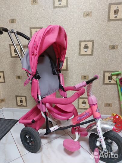 Трехколесный велосипед с ручкой