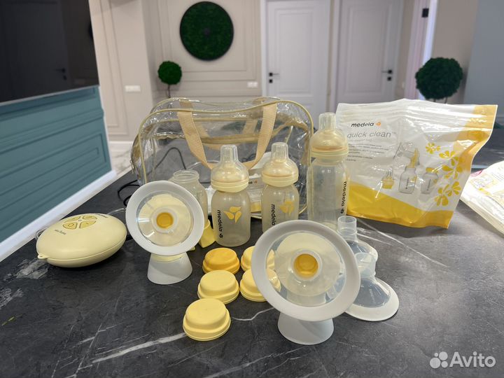 Молокоотсос medela swing maxi flex